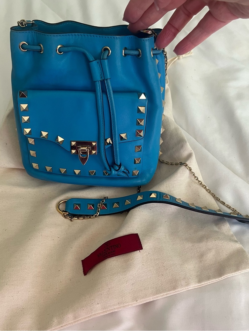 Valentino Garavani Blue Rockstud Drawstring small bucket crossbody